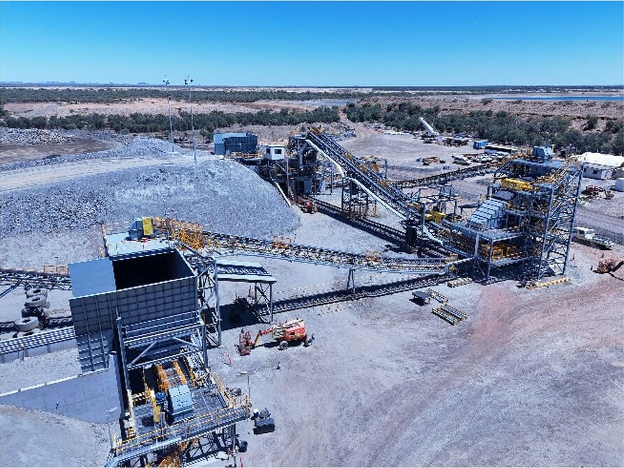 Aerial view of the Eloise processing plant expansion, showing the ROM bin, crusher, screening equipment, conveyors and ore stockpiles.