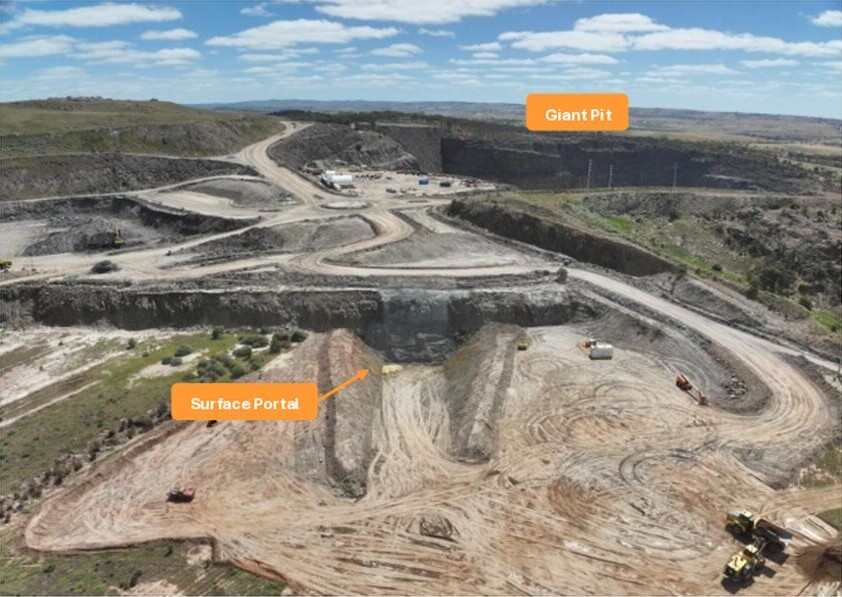Aerial view of Kanmantoo mine workings, with haul roads, benches, equipment and labels identifying the Giant Pit and Surface Portal.