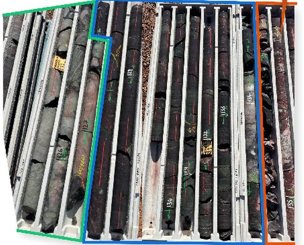 Photograph of diamond drill core laid in trays from KP Prospect diamond hole DD4, showing contrasting altered rock sections marked with coloured outlines.