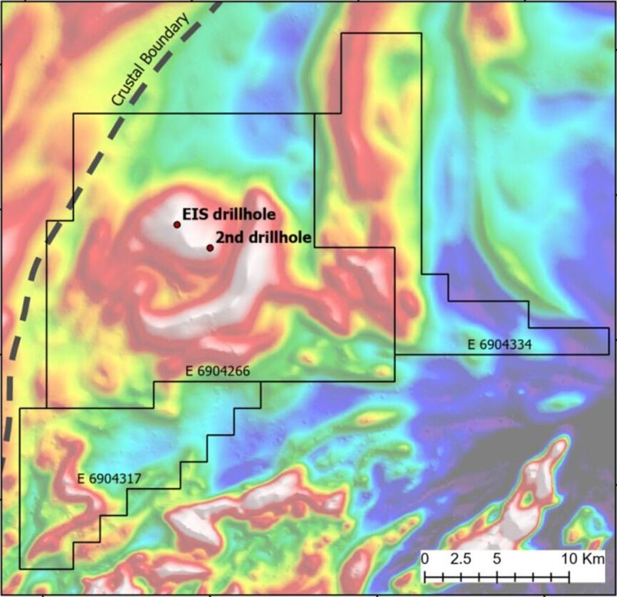 Reduced-to-pole total magnetic intensity map over the Cassowary target, showing the planned EIS drillhole, second drillhole, tenement boundaries and a dashed crustal boundary.